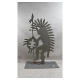 metal statue depicting a Native American figure