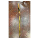 hand-carved and painted wooden walking stick