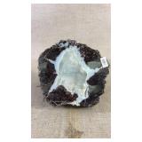 A polished half of a thunderegg rock formation