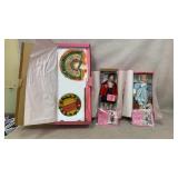 2 dolls, other items, largest box is 24in tall