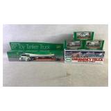 Collection of vintage Hess and Bp trucks, cars