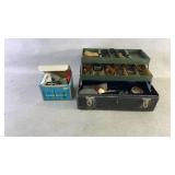 A fishing box with fishing hooks and supplies and