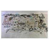 Assortment of costume jewelry with some silver