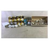 Assortment of lightbulbs some in boxes some loose
