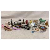 Miniature shoe figurines, cast iron donkey leg off