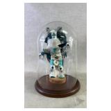 A Native American Kachina doll named chasing