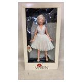Marilyn doll, box banged up 23", doll is fine,