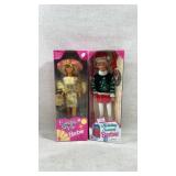 two Special Edition Barbie dolls in their