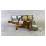 A antique wood stereoscope viewer with three