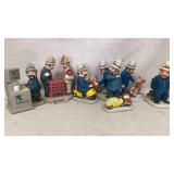 7 ceramic/plaster figurines, about 11in tall