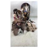 Masks and Sculptures With Feather Details