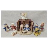 miniature nativity scene set with a creche and