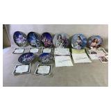 Eight uniquely designed plates signed