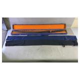 A stainless china katana inside a case with two