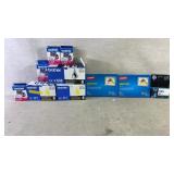 Assortment of printer ink and paper