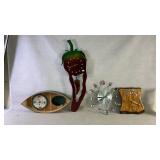 Four uniquely designed wall clocks