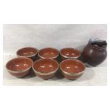 Pot and stoneware bowls