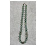 Collection of various beaded necklaces, including