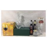 Decanter, vintage doors beers, wine glasses and