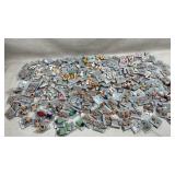 Large collection of clay earring and pins