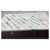 A white quilt with bow designs w 83 l 84