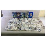 A large assortment of football and baseball cards