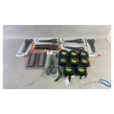 Assortment of scissors, utility knifes, and