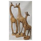 Three Hand-Carved Wooden Giraffe Sculptures