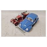 Model cars, one of the cars tires is missing, one