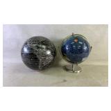 Two world globes one on stand one is not stand i