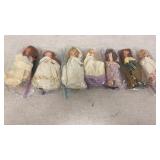7 Miniature Dolls