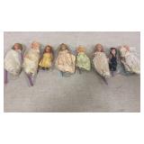 8 Miniature dolls
