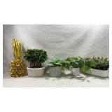 collection of assorted artificial potted plants