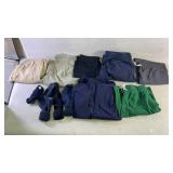 Assortment of clothing including pants, shorts