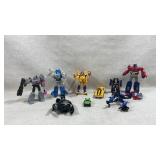 collection of various Transformers action figures