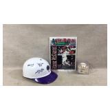 Signed baseball, baseball helmet and baseball book