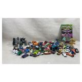collection of diecast toy vehicles, chess pieces