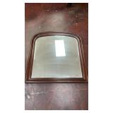 Large wood-framed arched top mirror