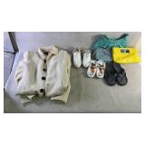 A coat, shoes, and purses