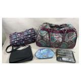 collection of bags including a large Kathy Van