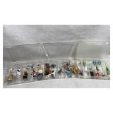 three clear plastic storage cases containing a