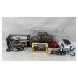 Model cars and motor cycles one is a coin bank