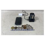 Samsung phone, foreign coins, ring batteries and
