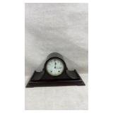 antique dark wood cased mantel clock made by the