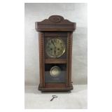 antique German wall clock w/ key