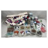 collection of jewelry-making supplies, including