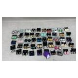 collection of various vintage costume earrings,