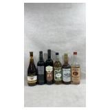 Collection of wines, vermouth, and vodka alcohol