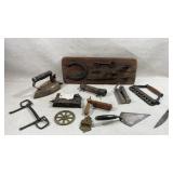 collection of antique cast iron tools and