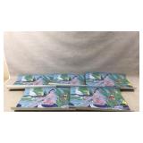 Rolled Artwork Depicting Woman and Birds